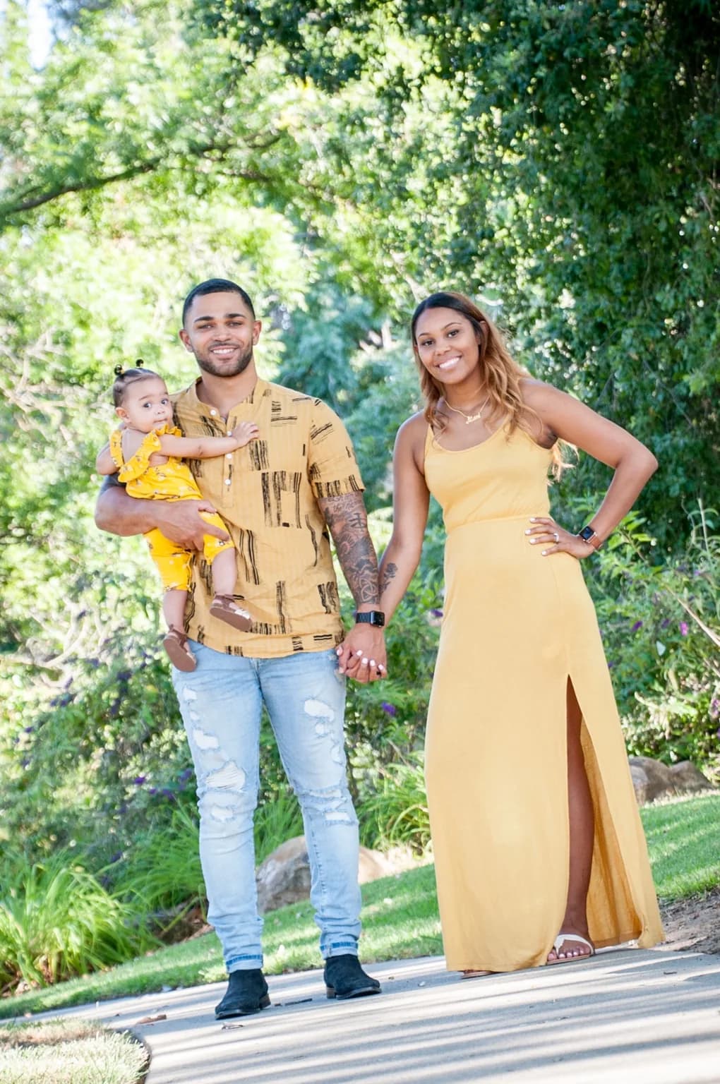 Anthony and Krystiana holding their first daughter